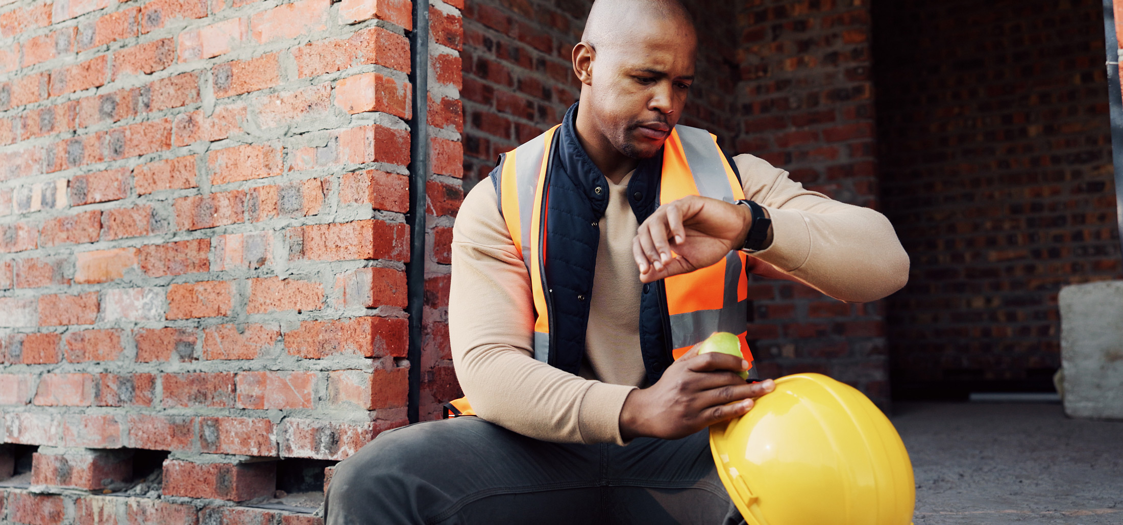 construction-worker-checking-smartwatch